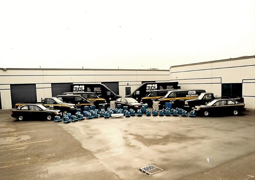 An older photo of CRCS's black vehicles and equipment.
